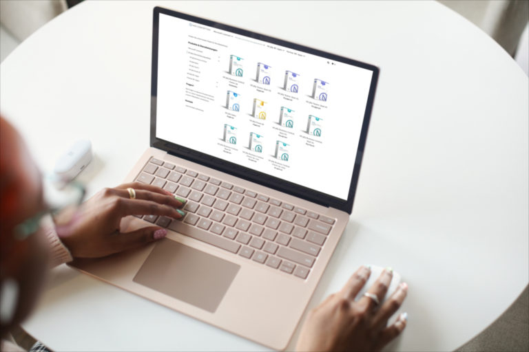 e commerce laptop mockup of a young woman using a surface laptop